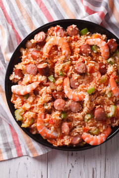 Creole jambalaya with shrimp and sausage close-up. vertical top view
