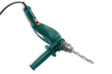 Electric drill with twist drill bit for metalworking closeup