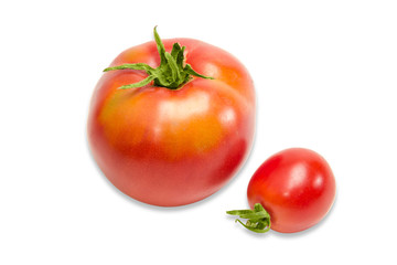 Two ripe red tomatoes different sizes closeup