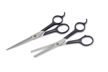 Two hairdressers scissors on a light background