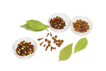 Spice - dried bay leaf, different types of pepper, clove