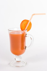 Glass of carrot  juice and fresh carrots isolated on white.