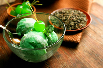 Homemade Green tea ice-cream on dark wooden background