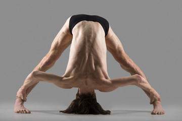 Wide Legged Forward Bend posture