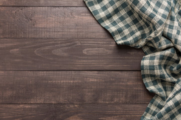 Napkin on the wooden background. Top view
