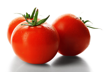 Red tomatoes isolated on white