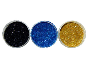 Three containers of glitter sparkles on white background