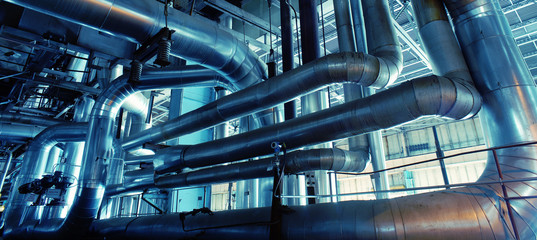 Fototapeta Industrial zone, Steel pipelines, valves and pumps obraz