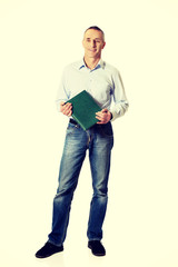 Fototapeta premium Handsome man holding his calendar