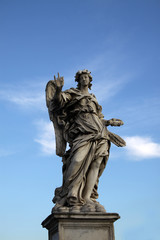 Fototapeta na wymiar Angel statue on the Ponte Sant Angelo in Rome, Italy