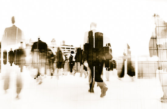Business People Walking on a City Scape Concept