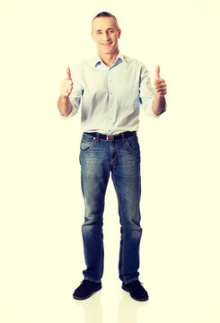 Mature man gesturing ok sign