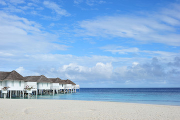 Maldive water villa - bungalows and white beach 