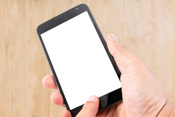 Man hand hold blank touch screen smart phone on wood texture for