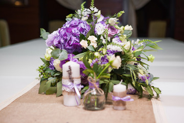 candles with lavender and bouquet flowers