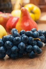 Fruit on old plank, grape, pears and apples