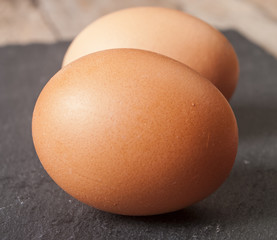 Fresh an egg isolated on black background