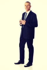 Businessman with clenched hands
