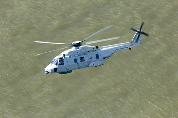Search and rescue helicopter over water