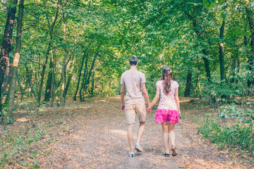 Fototapeta premium Couple walking in the park