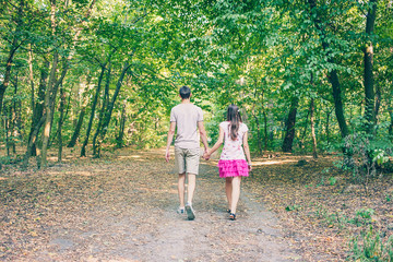 Fototapeta premium Couple walking in the park