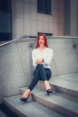 Fashion redhead young woman