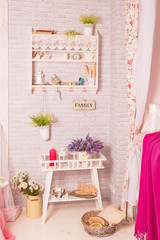 Delicate decoration with flowers and a table