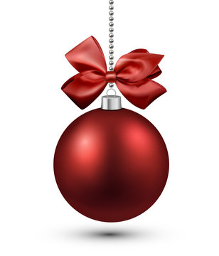 Red christmas bauble with bow.