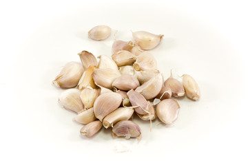 Garlic cloves isolated on white background
