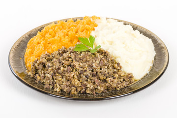 Haggis, Neeps & Tatties - Traditional Scottish meal commonly served at Burn's Night.
