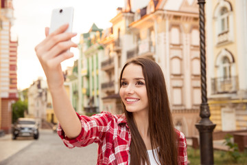 cute girl making selfe photo