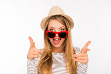 emotional funny girl in a hat with glasses