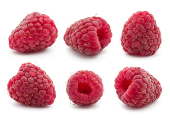 Collection of ripe red raspberries on white background