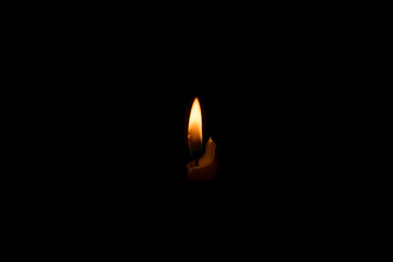 candle burning in the dark