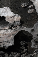 volcano etna sicily snow on lava