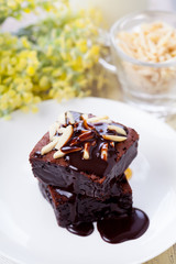 Chocolate brownies with almond and hot chocolate 