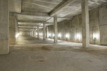 Empty industrial garage room interior with concrete