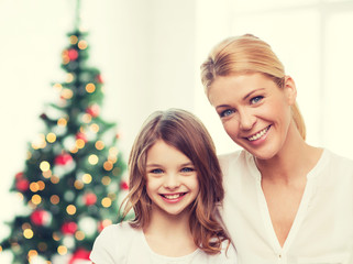 smiling mother and little girl