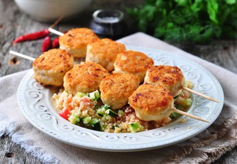 roasted turkey meat balls with couscous and vegetables