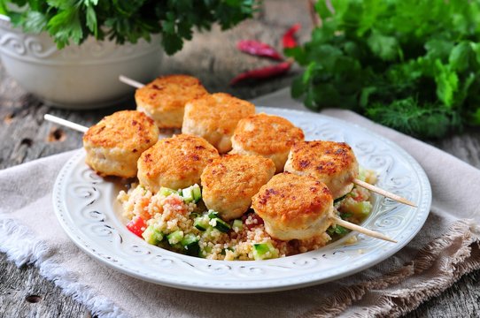 roasted turkey meat balls with couscous and vegetables