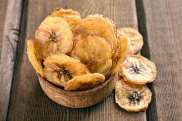Homemade banana chips in bowl