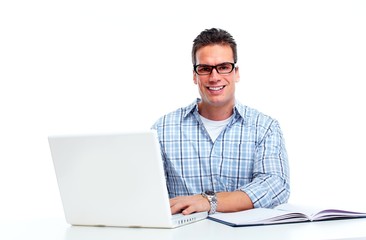 Man working with laptop computer.