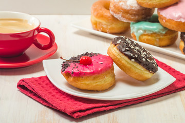 Donuts on a plate and coffee