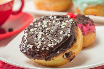 Donuts on a plate and coffee