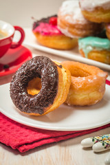 Donuts on a plate and coffee
