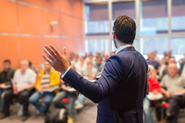 Speaker at Business Conference and Presentation.