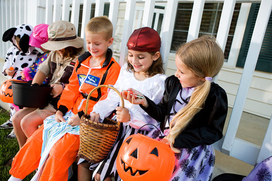 Halloween: Kids Comparing Halloween Candy