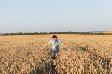 man on wheat field