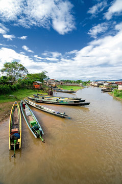 Wooden boat wharf at a river near Inle lake, Myanmar
