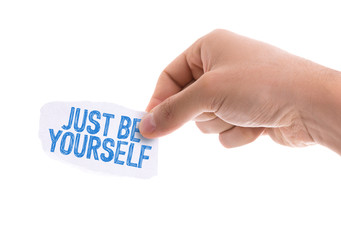 Piece of paper with the word Just be Yourself isolated on white